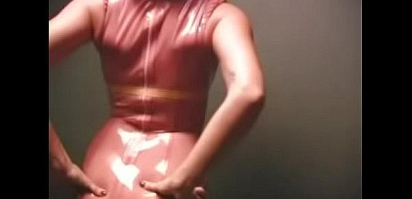  Stripping in Pink Latex